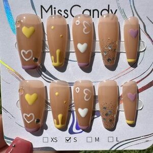Purple and Yellow Press-On Nails with Heart Motifs